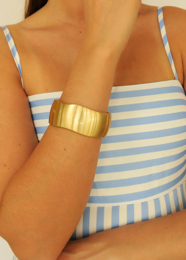 Thick Gold Bangle Bracelet with a Slight Wave