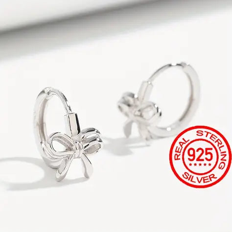 Sterling Silver Bow Huggies