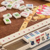 Whimsical Mahjong Tiles Featuring Bold Colored Winds