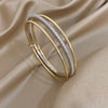 Three Attached Gold and CZ Bangles