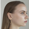 Hand Hammered Earrings With Turquoise Accent
