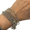 Set of 13 Silver Piano Wire and 4mm Gold Ball Bracelet