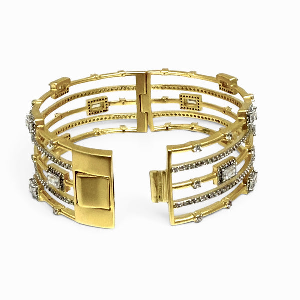 Multi-Row Gold Cuff Bracelet With Emerald Shaped Stones